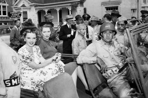 Judy Garland in jeep for 1943 parade of stars