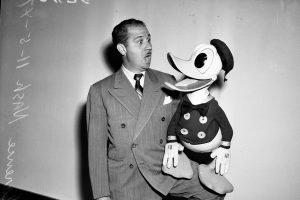 Clarence Nash (the voice) with Donald Duck puppet