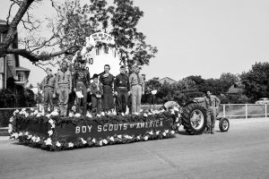 A parade float from a troop of Boy Scouts