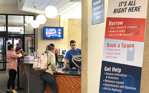 The John Peace Library is merging the circulation desk with the information desk to form a single-service area.