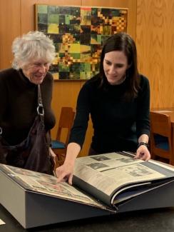 Diana and Amy Rushing looking at a cookbook